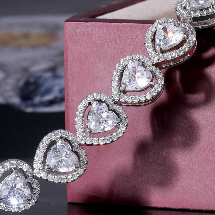 a diamond bracelet in the shape of hearts